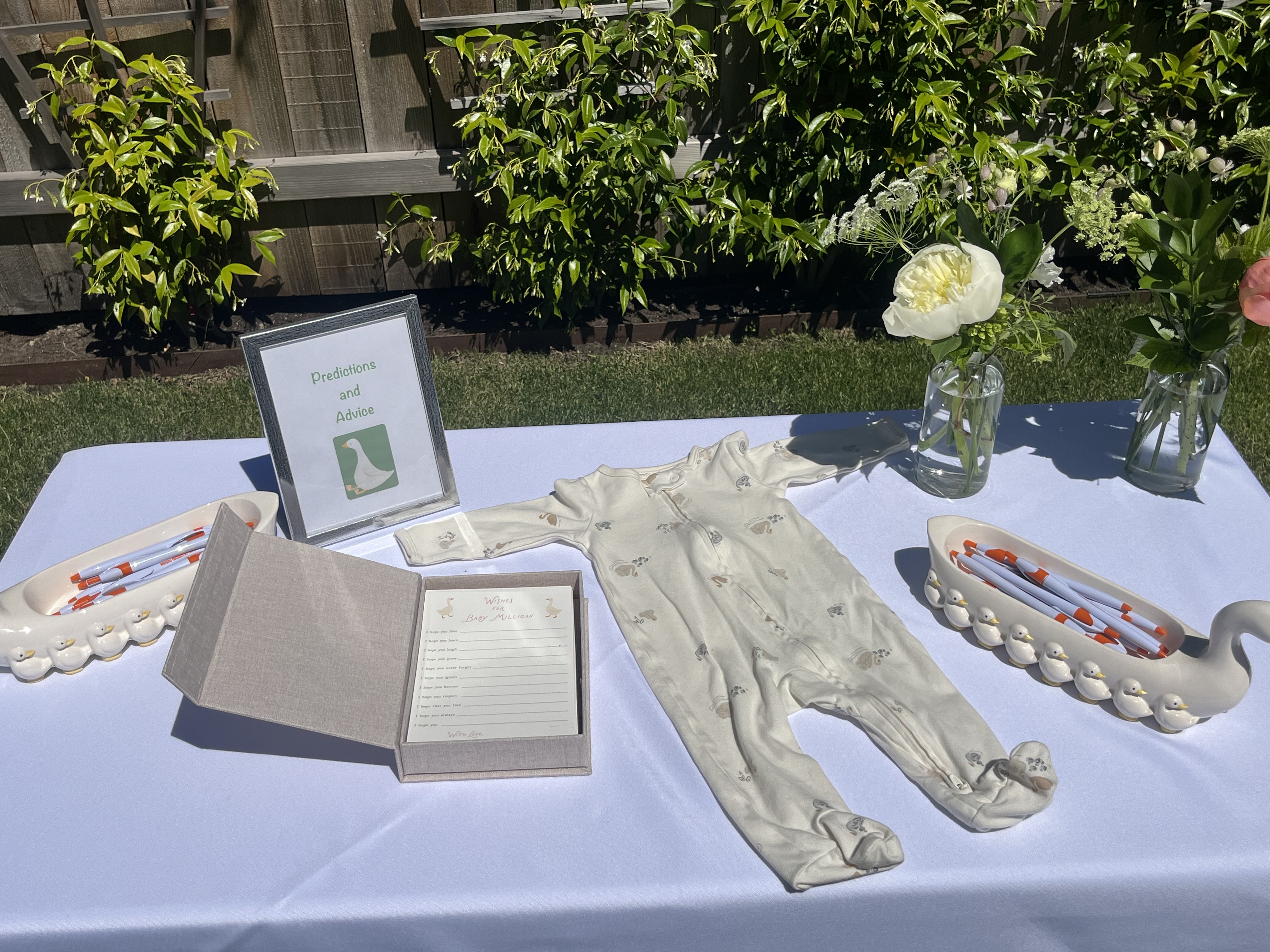 Baby shower décor with elegant floral centrepiece